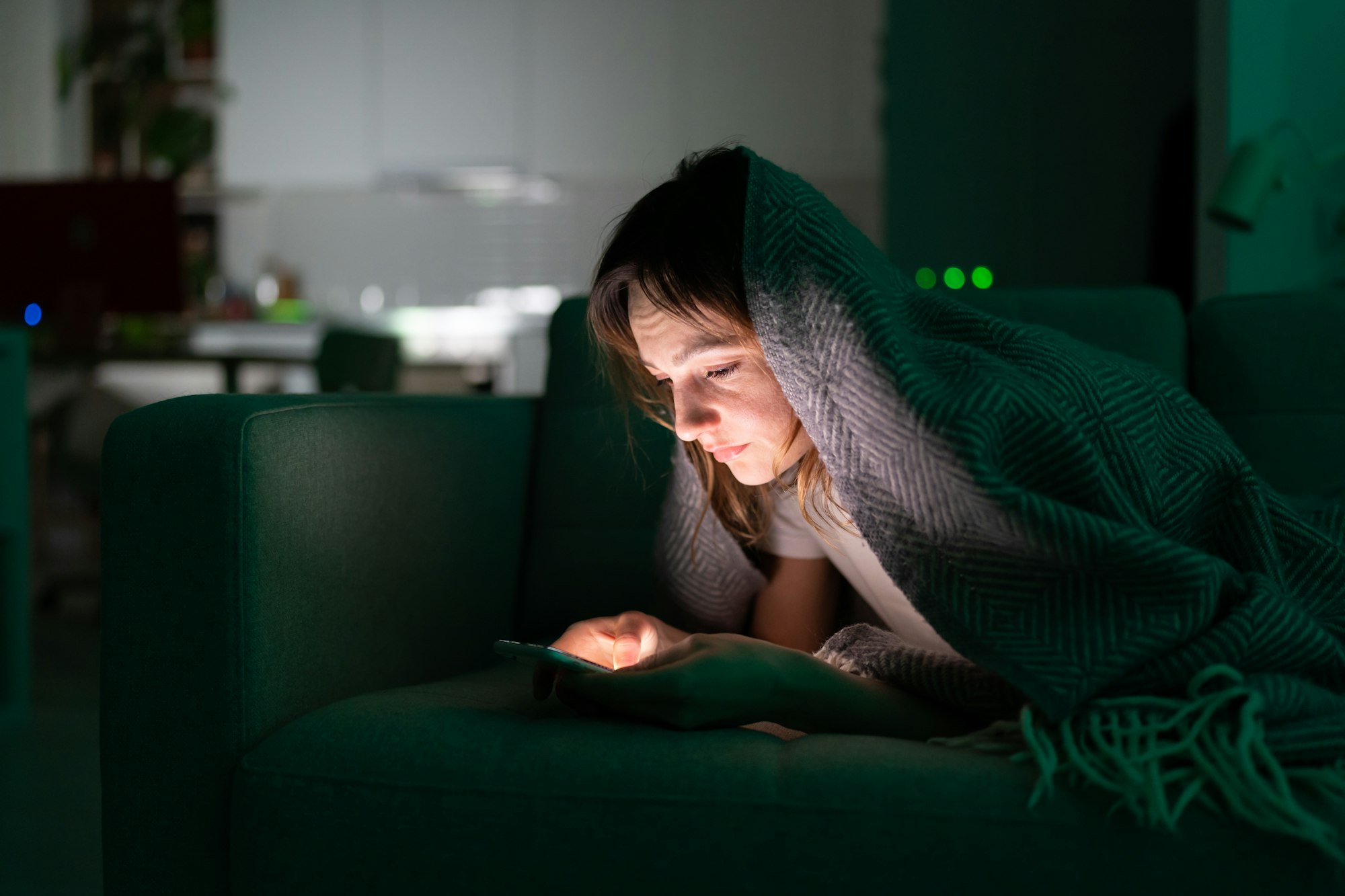 Addicted from social media woman surf internet in dark room at night. Sleep disorder problem concept