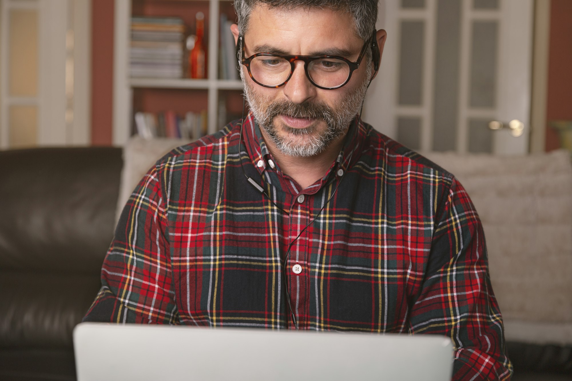 Men working from home, making video calls at work conference. Work at home. Remote work.